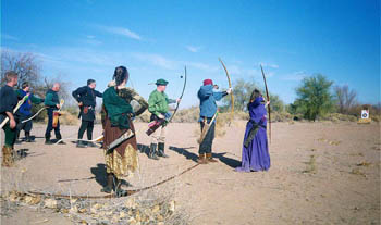Kingdom of Umbria archery line trying a little distance 'loosing' of arrows, Estrella Park, Spring 2000